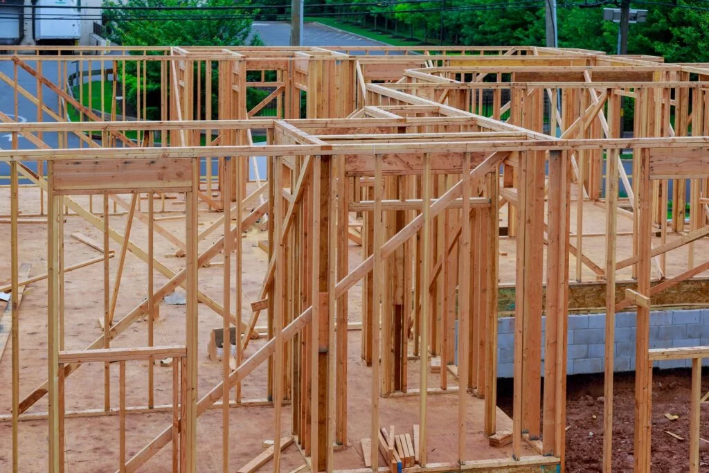 Abstract of Wood Home Framing at Construction Site. Building frame structure on a new development